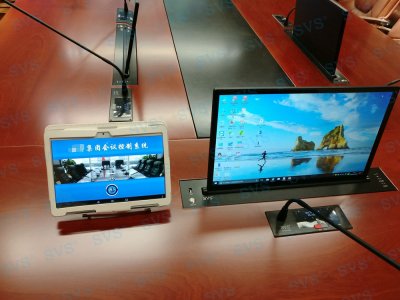 SVS嵌入式时钟会议系统为某集团公司无纸化会议此次SVS迅控为某集团公司打造一个无纸化会议室，会场作为高端视频会议室打造，各个方面迅